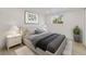 Bedroom featuring a neutral color palette, window, and artwork at 831 Wolf Trl, Casselberry, FL 32707