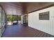 Enclosed back porch area with sliding glass doors leading inside at 831 Wolf Trl, Casselberry, FL 32707