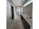 Modern bathroom with a soaking tub and dual vanities at 947 Ferne Dr, Longwood, FL 32779