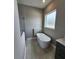 Bathroom with soaking tub and glass shower at 947 Ferne Dr, Longwood, FL 32779