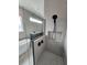 Luxurious shower featuring herringbone tile and a rain shower head at 947 Ferne Dr, Longwood, FL 32779
