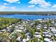 Picturesque aerial view of a residential community near a serene lake at 105 Canal Vw, Eustis, FL 32726
