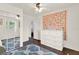 Bright and airy bedroom with a large dresser and mirrored closet at 105 Canal Vw, Eustis, FL 32726