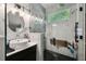 Sleek and modern bathroom featuring a vessel sink, rain shower head, and ample natural light at 1233 Bramley Ln, Deland, FL 32720