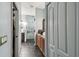 Hallway bathroom with modern fixtures, a walk-in shower, and ample storage space at 1233 Bramley Ln, Deland, FL 32720
