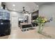 Open concept kitchen with stainless steel appliances, island, and view of the refrigerator at 1233 Bramley Ln, Deland, FL 32720