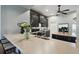 Bright kitchen with stainless steel sink, dark cabinets, and an island counter at 1233 Bramley Ln, Deland, FL 32720