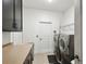 Well-organized laundry room with modern appliances and ample storage, offering convenience and efficiency at 1233 Bramley Ln, Deland, FL 32720