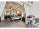 Expansive main bedroom with tray ceilings, seating, and decorative details at 1233 Bramley Ln, Deland, FL 32720
