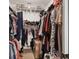 Walk-in closet with extensive hanging and shelving space for optimal storage at 1233 Bramley Ln, Deland, FL 32720