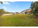 Expansive backyard featuring a gazebo and ample space for outdoor enjoyment at 12720 Greco Dr, Orlando, FL 32824