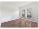Bright, airy bedroom with laminate floors and two windows offering ample natural light at 12720 Greco Dr, Orlando, FL 32824