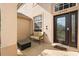 Inviting front porch with neutral furniture and direct access to front door at 12720 Greco Dr, Orlando, FL 32824