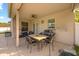 Covered patio with outdoor seating, a grill, and ample space for dining and entertaining at 12720 Greco Dr, Orlando, FL 32824