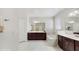 Spacious bathroom with separate tub, shower, and vanity provides a relaxing experience at 14345 Wabasso Loop, Winter Garden, FL 34787