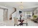 Bright and airy dining area adjacent to the kitchen and living room, perfect for entertaining at 14345 Wabasso Loop, Winter Garden, FL 34787