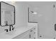 Modern bathroom with black hardware, vanity, and enclosed shower at 1602 Park Lake St # 2, Orlando, FL 32803
