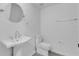 Half bath featuring a custom vanity and tiled floors at 1602 Park Lake St # 2, Orlando, FL 32803
