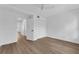 Inviting bedroom displays light wood flooring, a ceiling fan, and neutral color palette at 1602 Park Lake St # 2, Orlando, FL 32803