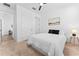 Cozy bedroom featuring a comfortable queen bed, carpet and a picture hanging on the wall at 1639 Meadowlark Dr, Deltona, FL 32725