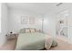 Comfortable bedroom with access to an en-suite bathroom, creating a private retreat at 1639 Meadowlark Dr, Deltona, FL 32725