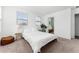 Bright bedroom featuring a queen bed and access to sitting room at 1639 Meadowlark Dr, Deltona, FL 32725