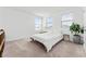 Airy bedroom with three windows offering plenty of natural light at 1639 Meadowlark Dr, Deltona, FL 32725