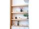 Close up of decoratively styled display shelves in modern living room at 1639 Meadowlark Dr, Deltona, FL 32725