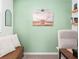 Inviting home office with mint green walls, rustic decor, and comfortable seating at 1639 Meadowlark Dr, Deltona, FL 32725