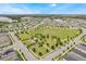 Expansive aerial view of a Gathering-friendly neighborhood, with green spaces, walking trails, and a playground at 16781 Wingspread Loop, Winter Garden, FL 34787