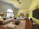 Bright and airy living room featuring natural light, modern furniture, and stylish decor, perfect for relaxation at 1931 Clarcona Rd, Apopka, FL 32703