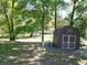 Well-maintained shed in a spacious yard, offering additional storage and utility at 1931 Clarcona Rd, Apopka, FL 32703