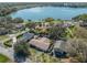 Panoramic aerial view of the property showcasing the lakefront location and neighborhood at 2136 Topping Pl, Eustis, FL 32726