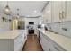 Well-equipped kitchen featuring stainless steel appliances, subway tile backsplash, and modern fixtures at 2136 Topping Pl, Eustis, FL 32726