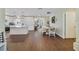 Bright and spacious kitchen featuring modern appliances, a large island, and stylish dining area at 2136 Topping Pl, Eustis, FL 32726