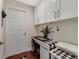Small home office featuring built-in cabinetry, desk, and ample lighting at 2136 Topping Pl, Eustis, FL 32726