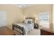 Cozy bedroom with carpet flooring featuring neutral tones and natural light at 2140 Lilypad Ln, Windermere, FL 34786