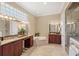 Spacious main bathroom with double vanities, a soaking tub, and a separate glass shower at 2140 Lilypad Ln, Windermere, FL 34786