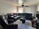 Cozy living room showcasing a plush sectional sofa and contemporary decor at 227 Strawberry Ln, Daytona Beach, FL 32117
