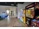 Fun-filled game room with air hockey and arcade games at 2653 Roadster Ln, Kissimmee, FL 34746