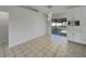 Bright dining area with tile floors, modern lighting and adjacent to the kitchen, perfect for Gathering meals at 2936 Woodcrest Ln, Lakeland, FL 33805