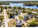 Neighborhood aerial view showcasing home's proximity to a beautiful lake at 380 Dorset Ave, Deltona, FL 32738