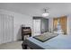 Cozy bedroom with a desk, guitar, and a neutral color scheme with ample natural light from the window at 380 Dorset Ave, Deltona, FL 32738