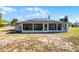 Charming home featuring a screened patio perfect for enjoying the outdoors at 380 Dorset Ave, Deltona, FL 32738