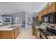Spacious kitchen with a large center island and modern appliances, perfect for cooking at 380 Dorset Ave, Deltona, FL 32738