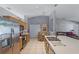 Open kitchen features stainless steel appliances, tile floors, and a breakfast nook at 380 Dorset Ave, Deltona, FL 32738