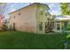 Large private backyard features screened in pool area and lush landscaping at 452 Opal Ct, Altamonte Springs, FL 32714