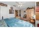 Bedroom with ceiling fan, wooden furniture, and bright sunny windows bringing in lots of natural light at 452 Opal Ct, Altamonte Springs, FL 32714