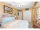 Comfortable main bedroom with closet, ceiling fan, and vintage decor at 452 Opal Ct, Altamonte Springs, FL 32714
