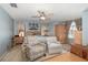Spacious bedroom features a sitting area and traditional furnishings at 452 Opal Ct, Altamonte Springs, FL 32714